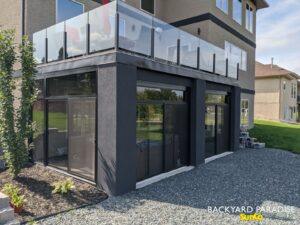 Black curtain wall, walk out basement sunroom enclosure , East st Paul , Manitoba 3