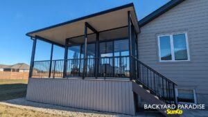 Black studio sunroom with composite deck and black aluminum rail , Headingley , Manitoba 5