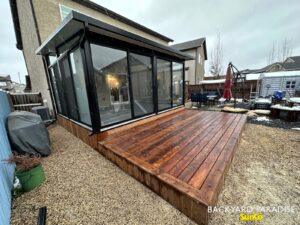 Black studio sunroom with treated wood deck , Transcona , Winnipeg , Manitoba 1