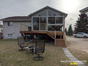 Sandalwood and White Gable sunroom with wrap around deck , Stonewall, Manitoba