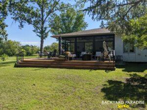 Treated lumber deck with black aluminum railings in St Andrews, Manitoba 3
