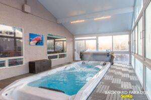White Gable swim spa sunroom with treated stadium staircase, Lindenwoods , Winnipeg , Manitoba 4