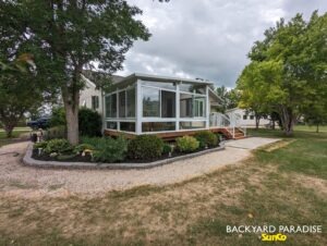 White studio sunroom with treated wood deck and white aluminum picket railings East st Paul 5