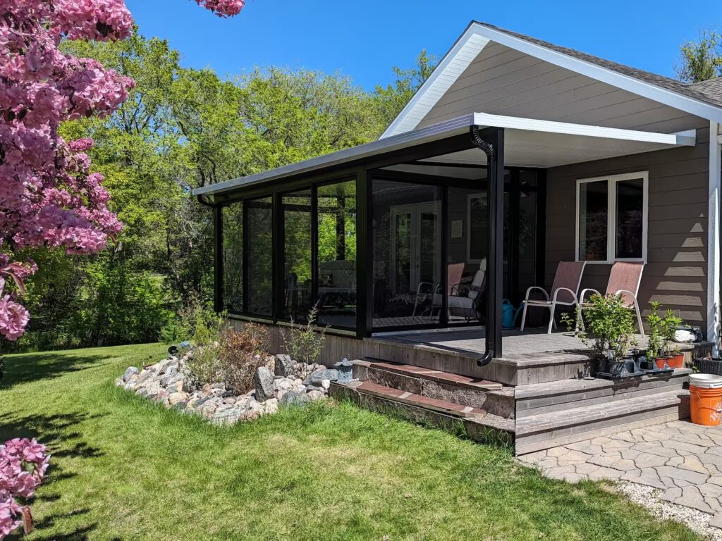 black sudio sunroom with awning by SunCo in East Selkirk, Manitoba