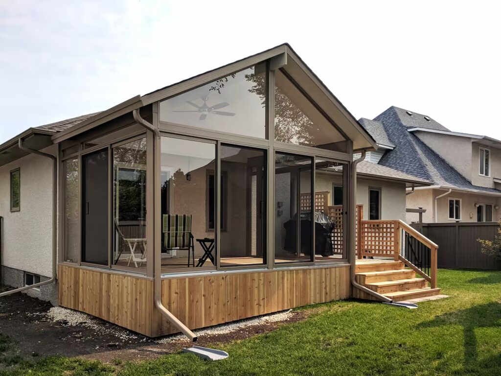 sandalwood gable sunroom with cedar deck by SunCo in Normand Park, Winnipeg