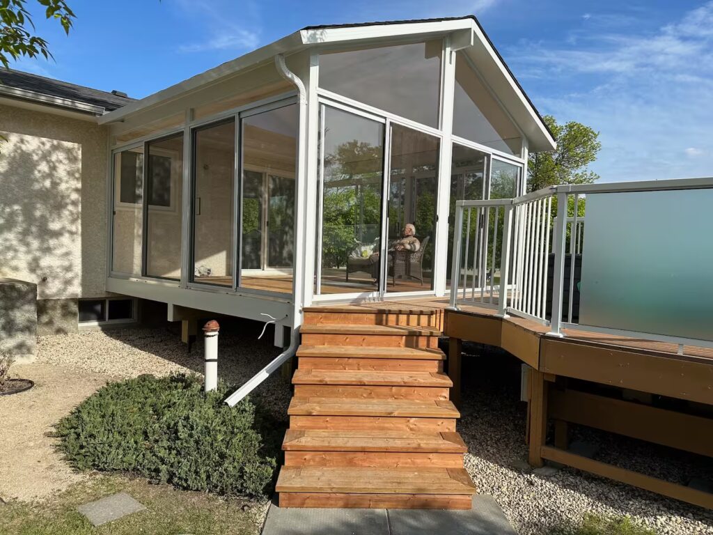 white gable sunroom by SunCo in Saint Adolphe, Manitoba